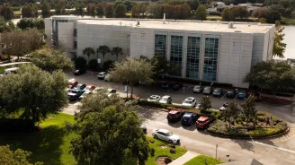 A bird's-eye view of the AdventHealth University building and surrounding area.