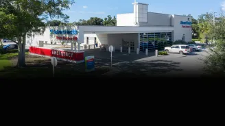 A three-quarters view of the AdventHealth Palm Harbor ER building