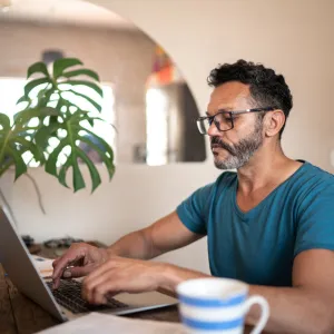 A mature gentleman on his laptop