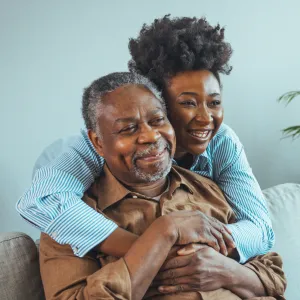 A Daughter Hugs Her Senior Father