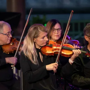 The AdventHealth employee orchestra performs at Disney Springs. 