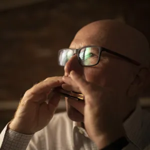 Man playing a harmonica