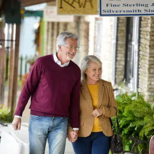 Couple happily shopping.