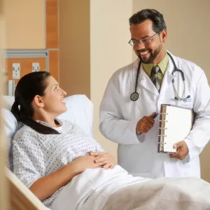 Doctor in room with patient
