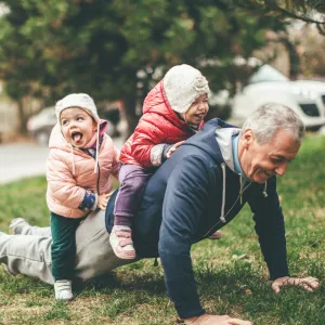 Man playing with children