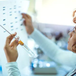 woman reading DNA