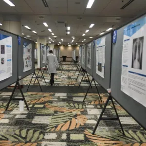 An aisle of research presentations