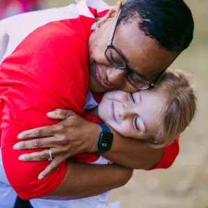 Mrs. Carlene Honor hugs Kennedy Vogt at the Greater Orlando Heart Walk.