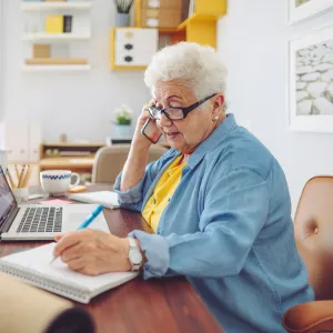 Elderly Woman working from home