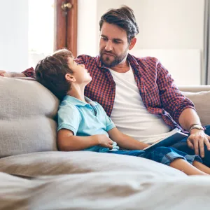 A father and son have a heart to heart conversation.