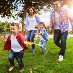 Happy family outdoors.