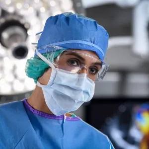 Female surgeon wearing mask