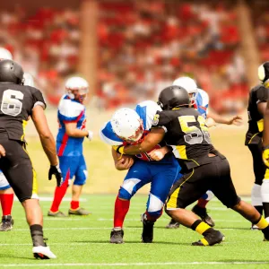 Athletes playing football