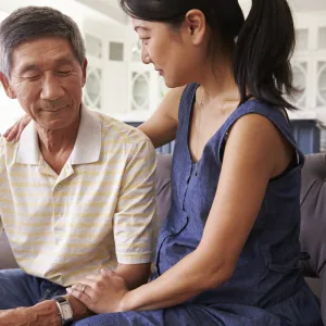 Woman helping man