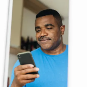 Man reading iPhone