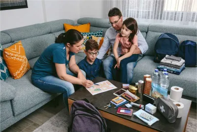 Family preparing wild fire evacuation plan.