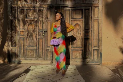 Sharlene after bariatric surgery, standing in front of a building
