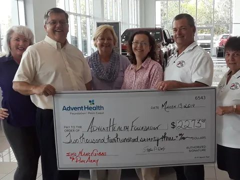 Local Corvette Club Donation Helps Fight Breast Cancer