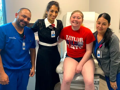 Kailey with her clinical team.