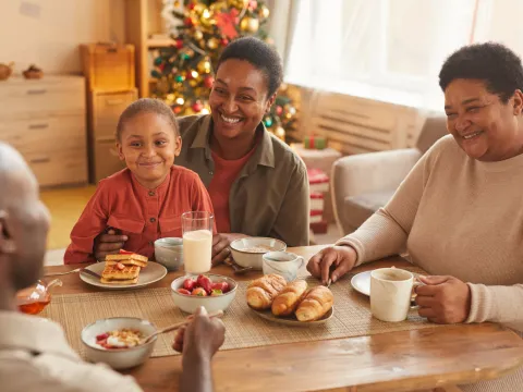 An African family enjoying their holiday dinner with each other