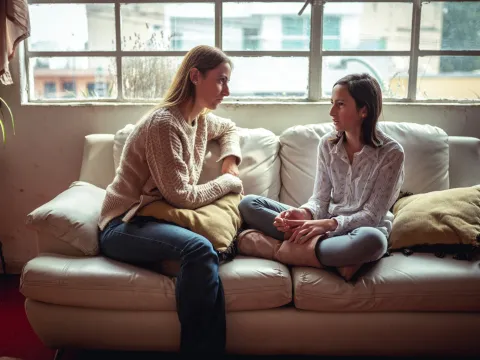 A Woman Speaks to Her Daughter About a Serious Subject