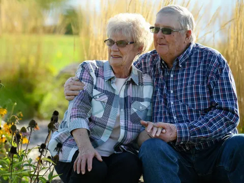 Senior Couple Sitting Together 