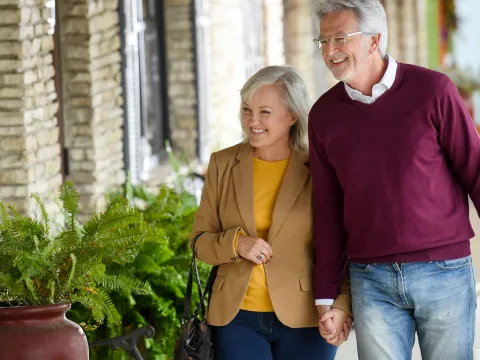 Elderly couple on a shopping trip.