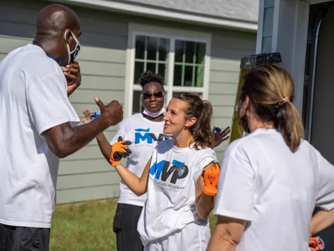 Magic Volunteer Program at a Habitat for Humanity event.