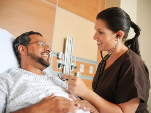 Nurse helps a patient