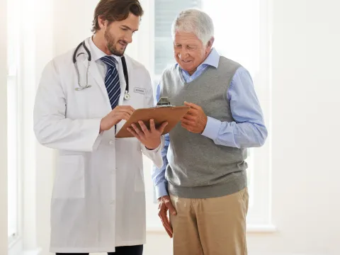 Older man visits the doctor for tests