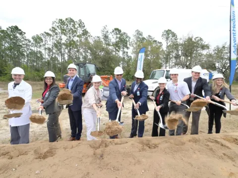 Waterman MOB shoveling dirt groundbreaking