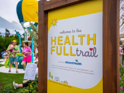AdventHealth Healthfull Trail sign at AdventHealth Healthfull Trail at the 2022 Epcot Flower and Garden Festival.