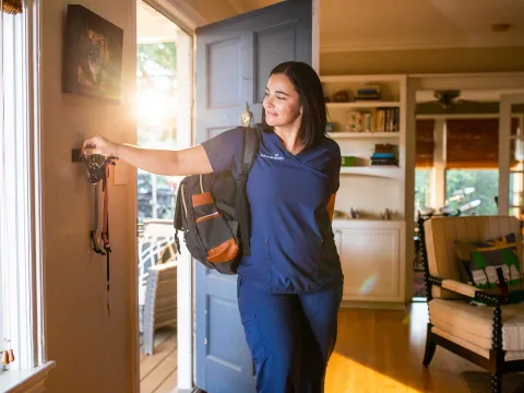 An AdventHealth medical employee heading to work
