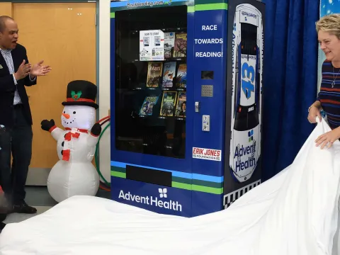 AdventHealth donates book vending machine to Discovery Elementary.