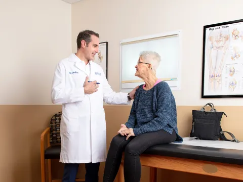 Doctor talking to patient
