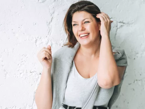 A smiling woman posing for a photo