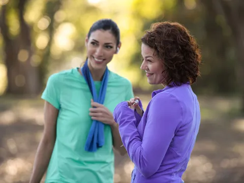 Two women taking a break during a run