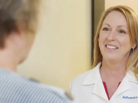 Dr. Charlotte Brookes with a patient