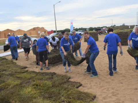 AdventHealth Sebring team members laying sod during the Day of Caring