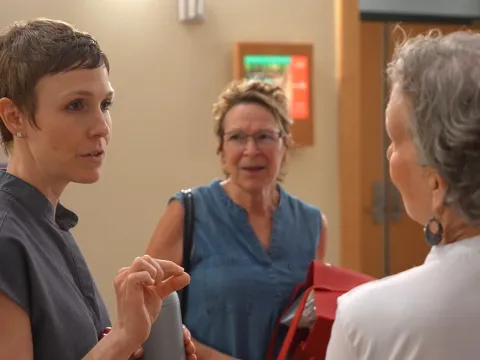 Dr. Amber Orman discusses the HEAL program with some of her patients.
