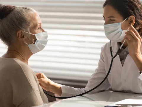 Female Doctor with Female Patient Masks