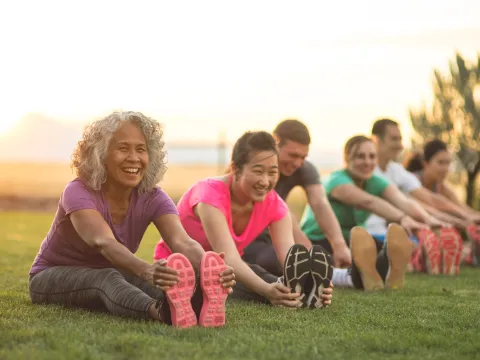 woman stretches before exercising
