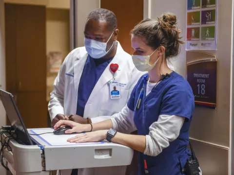 Two AdventHealth team members in the hospital.