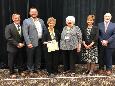 AdventHealth Ottawa Administration and Auxiliary receiving the Gold Award of Excellence