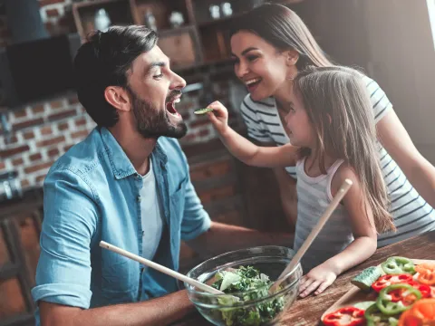 A family enjoying their cooking moment together