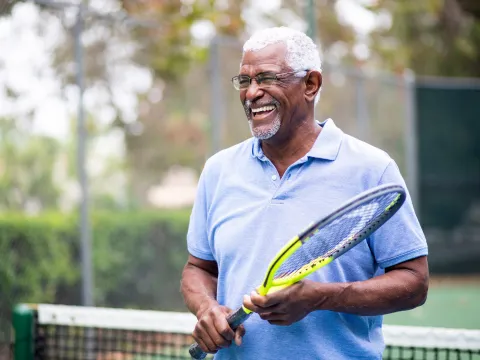An older gentleman on the tennis court