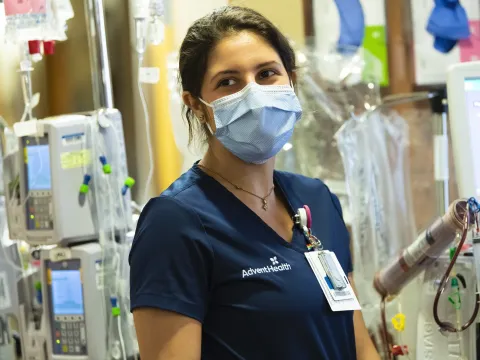 A nurse wearing a face mask at a facility.