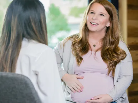 A mom-to-be meets with her doctor.