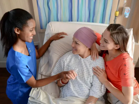 Cancer Patient speaking with doctor.