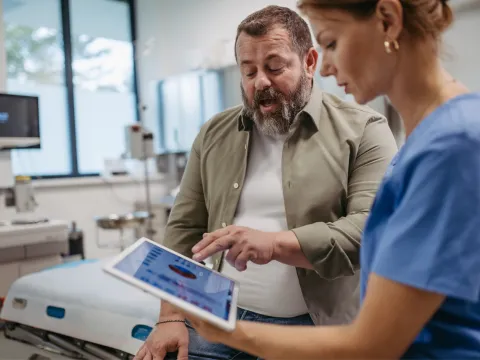 Patient and Physician looking at a screen